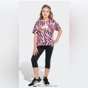 Adidas logo all over print tee zebra top. Sz small 7/8 Orange/pink/black stripes